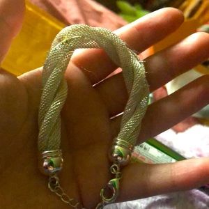 Grayish white bracelet 10$